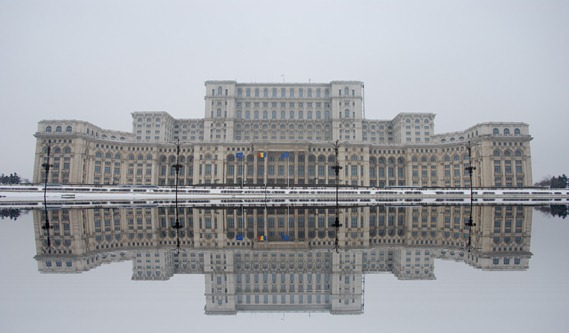 The Palace of the Parliament (Romanian: Palatul Parlamentului) in Bucharest, Romania is a multi-purpose building containing both chambers of the Romanian Parliament. According to the Guinness Book of World Records, the Palace is the world's largest civilian administrative building, most expensive administrative building, and heaviest building.</p>
<p>http://en.wikipedia.org/wiki/Palace_of_the_Parliament