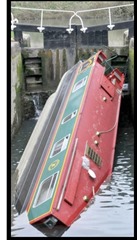 Capsized narrow boat stuck in lock No: 11 in Widcombe

pic by Lloyd Ellington 170314 news
