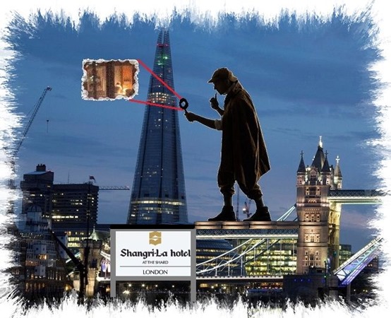 The Shard skyscraper lit up by a laser light show to celebrate the inauguration of Europe's tallest building, designed by Italian architect Renzo Piano, seen by London's Tower Bridge.